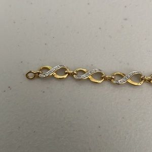 Gold with diamond ascents infinity bracelet